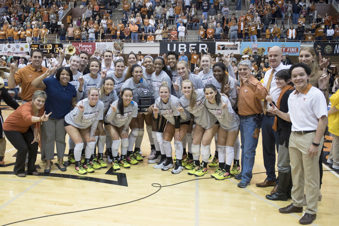 UT Women's Volleyball team with trophy. 