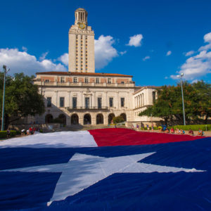 The Texas flag on display in front of the UT Tower