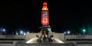 UT Tower shines with burnt orange lights and "20" on its side