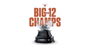 A trophy with text that says "Big 12 Champs" and shows the Texas Longhorn logo