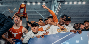 Texas student athletes celebrate after winning a national title.