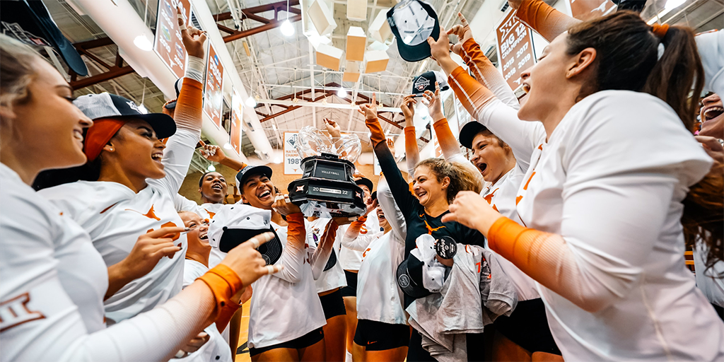 Texas women's volleyball celebrating their win in the Big 12 Championship