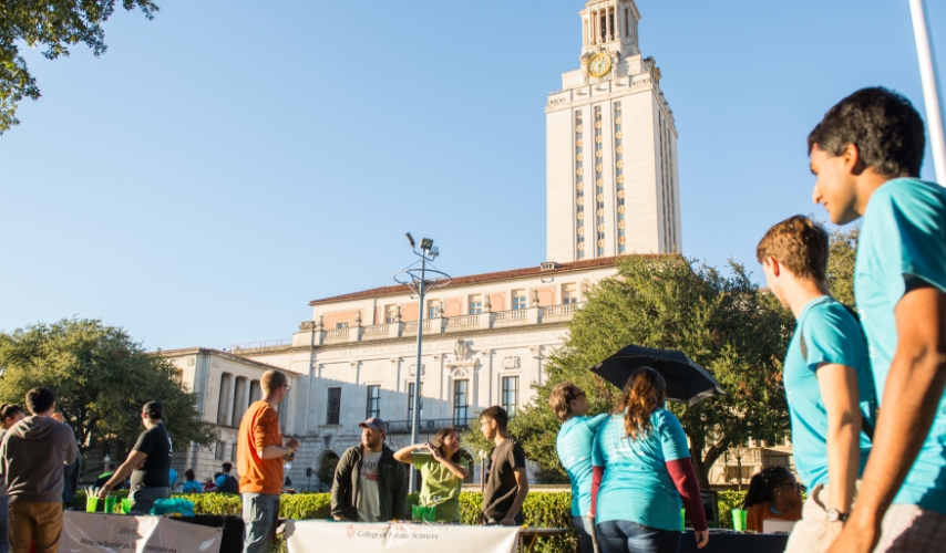 UT Tower with students walking on the south mall