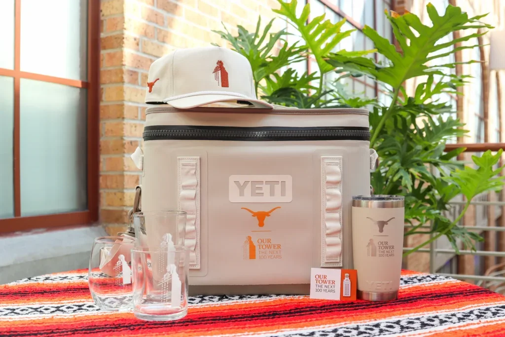 Our Tower pin, hat, Yeti tumbler, glass set, and Yeti cooler
